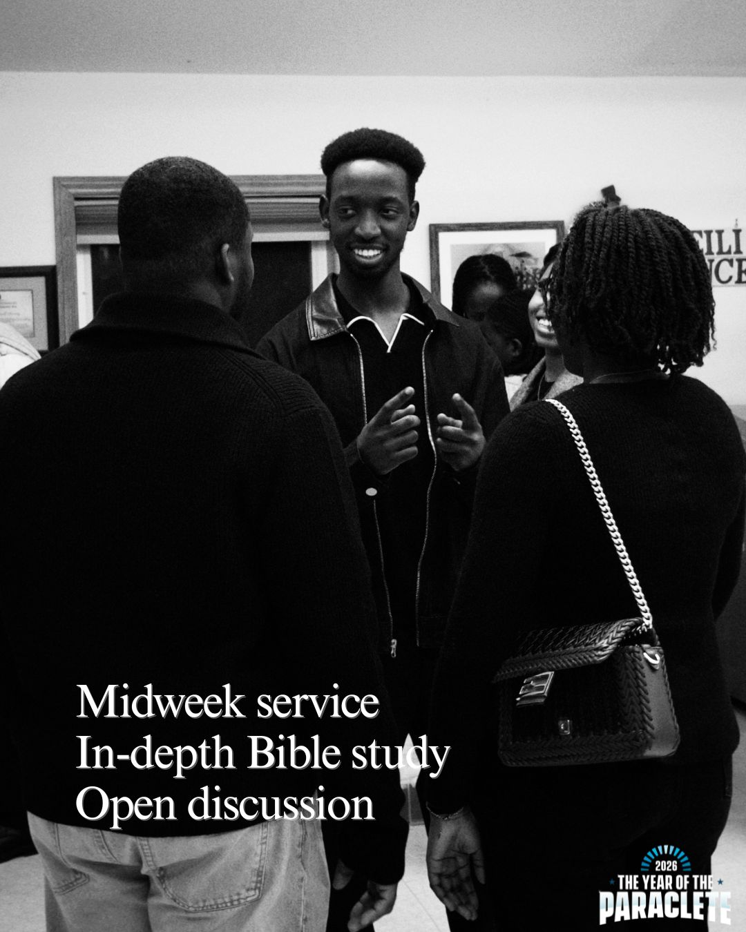 Members in conversation at midweek service Bible study